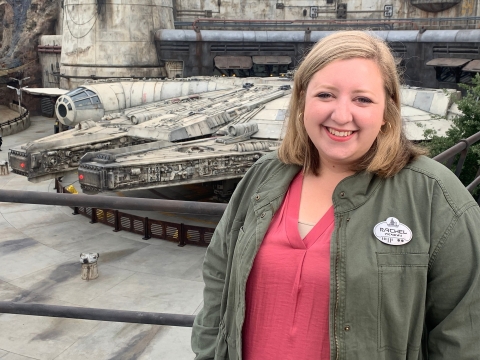 Rachel Sherbill standing in front of the Millennium Falcon