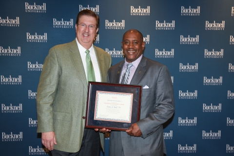 Gary Bell pictured next to President Bravman