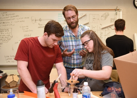 Professor and students in Mooney Lab