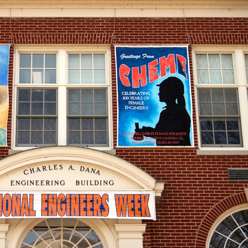 Banners hang above the front entrance to Dana Engineering