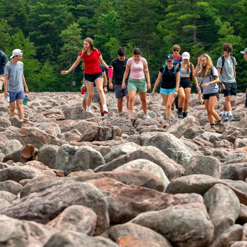 BuckWild, students walking on rocks