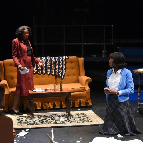 Students performing in the play Crumbs from the Table of Joy